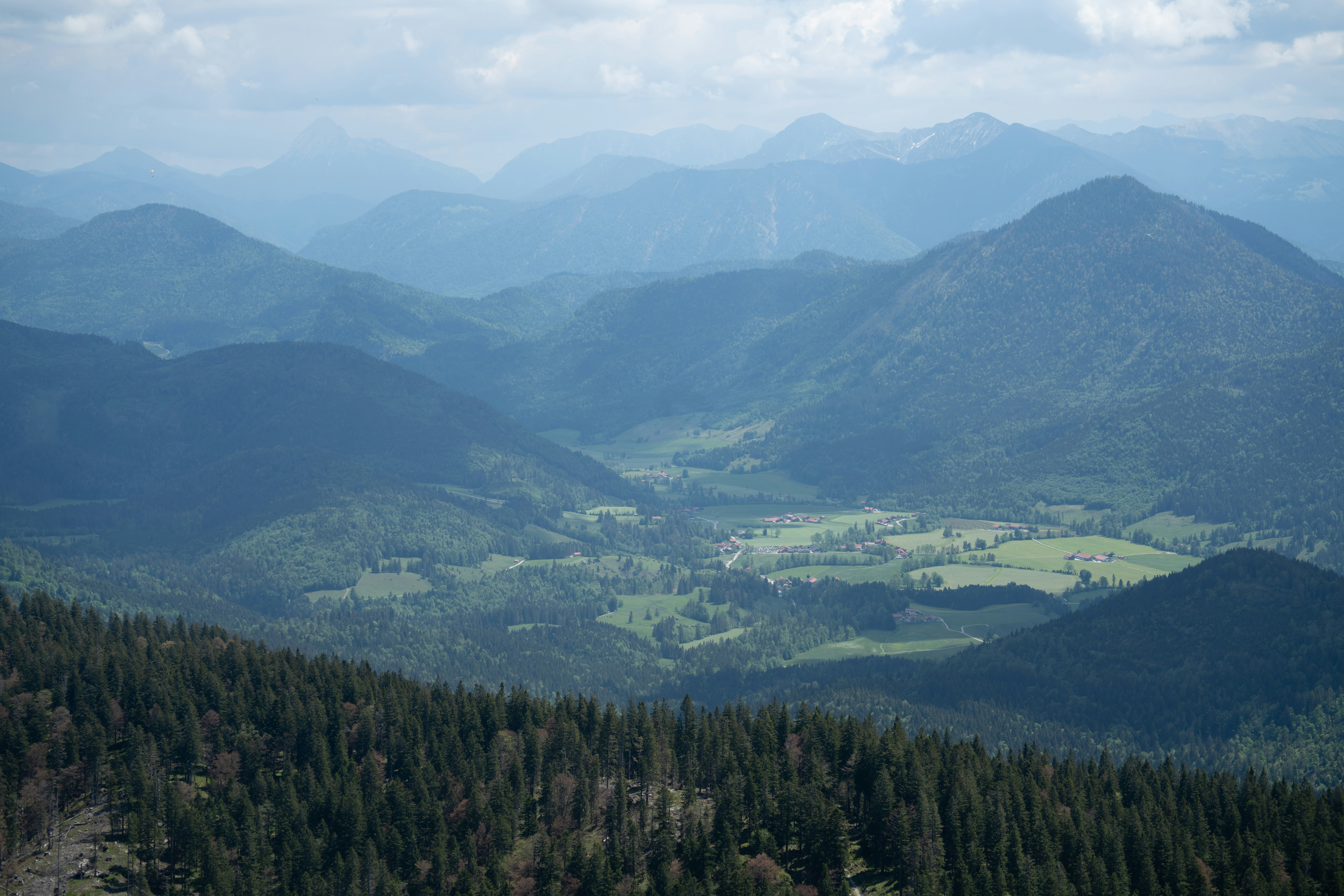 green trees on green mountains during daytime